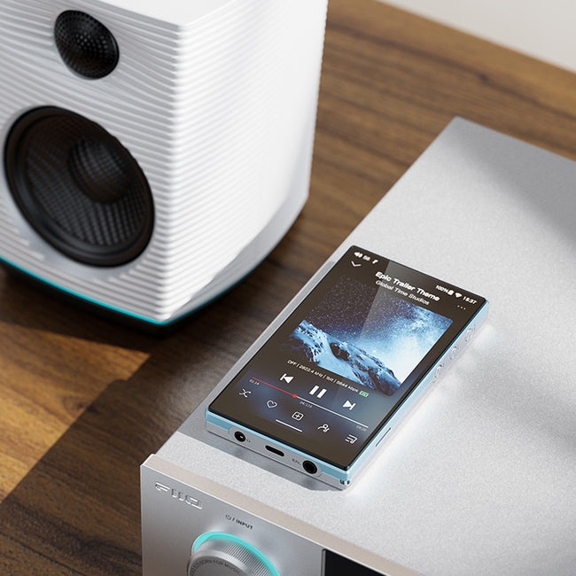 FiiO JM21 – Hi-Res Lossless Portable Digital Audio Player – DAP, Blue Sky
נגן אודיו דיגיטלי נייד מבית פיו, FiiO JM21 , כולל מגבר אוזניות וממיר דיגיטל לאנלוג, צבע כסף/תכלת