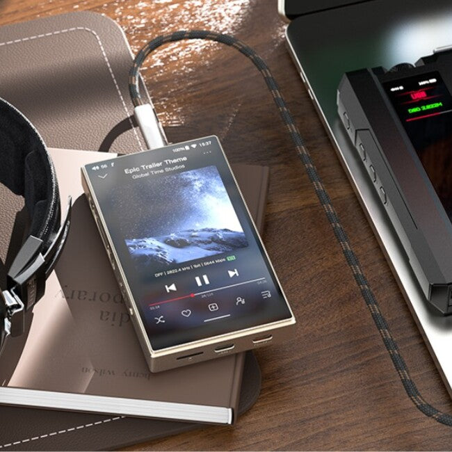 FiiO M21 – Hi-Res Lossless Portable Digital Audio Player – DAP, Titanium-Gold
נגן אודיו דיגיטלי נייד יוקרתי מבית פיו, FiiO M21, כולל מגבר אוזניות עוצמתי וממיר דיגיטל לאנלוג, לשימוש גם לאוזניות אינאיר וגם לאוזניות קשת אודיופיליות, צבע זהב-טיטניום